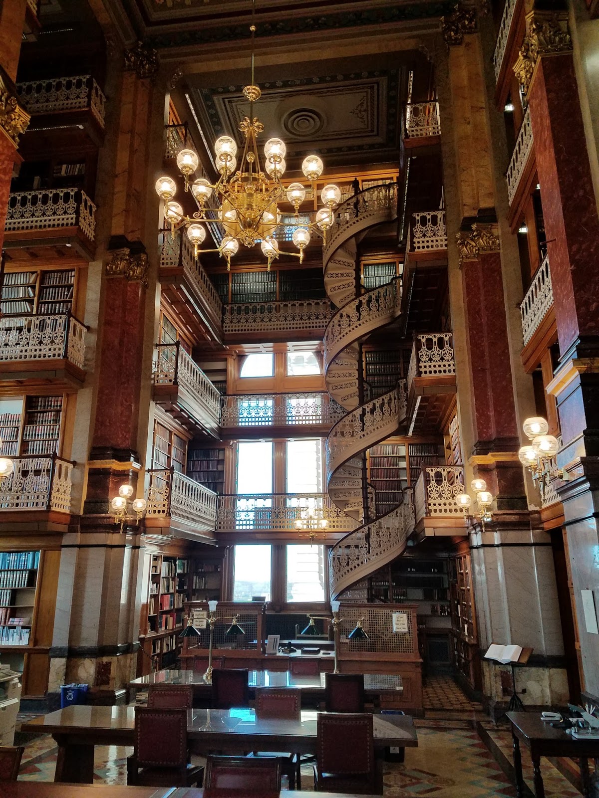 The Library of the Des Moines Capitol with 4 stories and winding staircase.